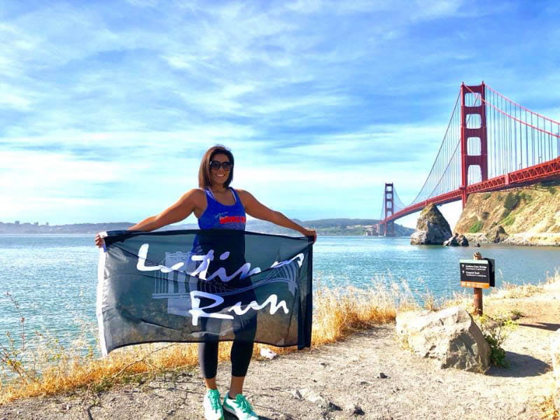 Maria Solis Belizaire at the Golden Gate Bridge in San Francisco. A running group she started has grown to thousands of members. (Photo courtesy of Maria Solis Belizaire)