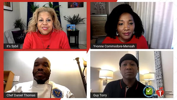 a grid of two Black women and two Black men smiling in a remote video conference