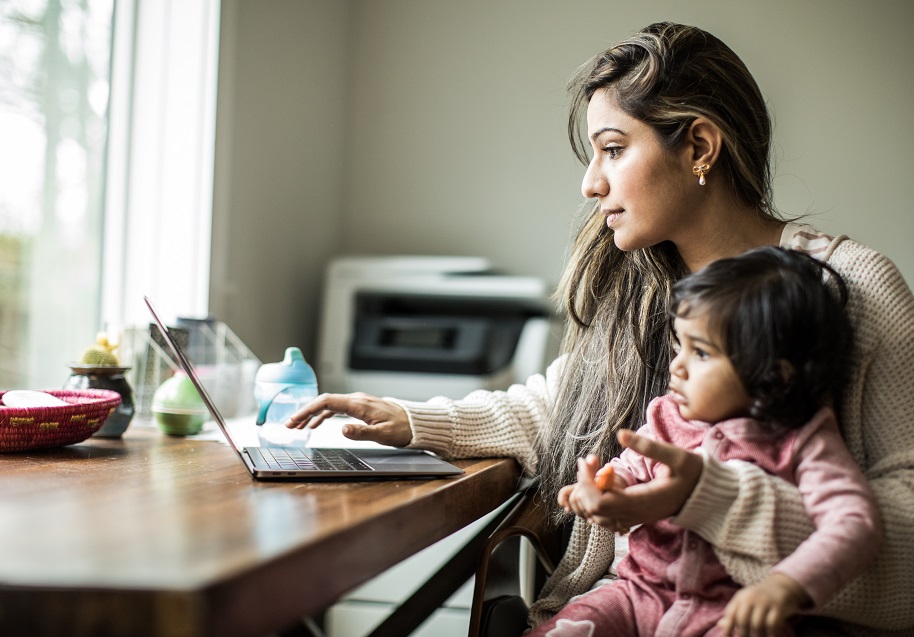 Mother and daughter using a laptop