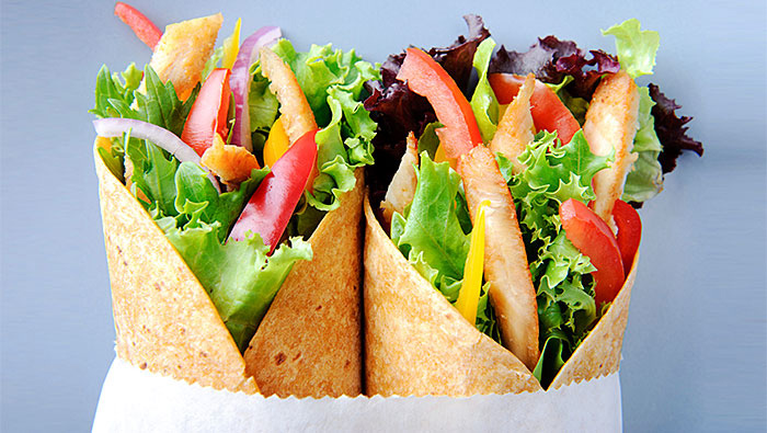 close up of two healthy chicken wraps