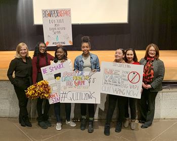 Students from Townsend Harris HS with their signs calling out Big Vape