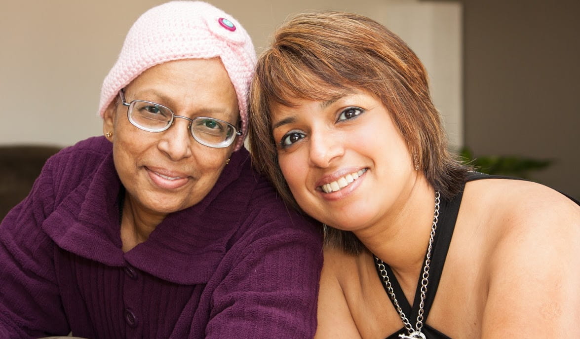 woman with cancer and adult daughter