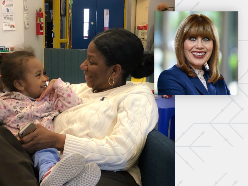 Cherie Craft shares a laugh with a child at Smart from the Start, the Boston organization she founded to help economically disadvantaged children. (Photo courtesy of Cherie Craft)