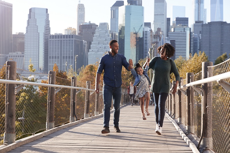 family walking downtown