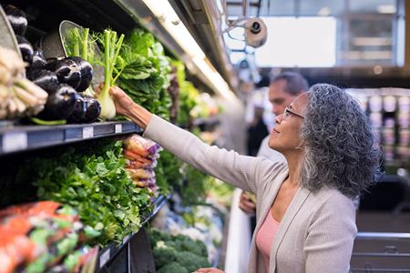woman shopping fresh produce in store woman shopping fresh produce in store