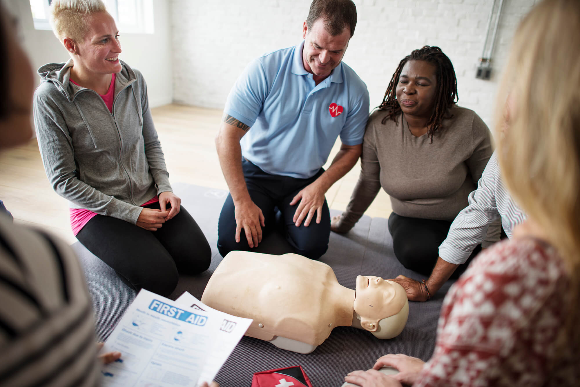 Adults Practicing CPR