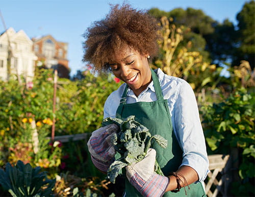 Woman in an urban garden
