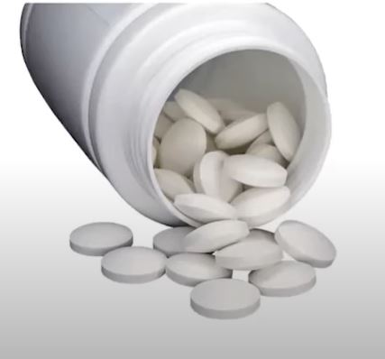 bottle of white pills