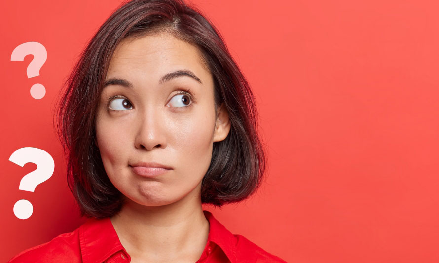closeup of woman with question marks closeup of woman with question marks